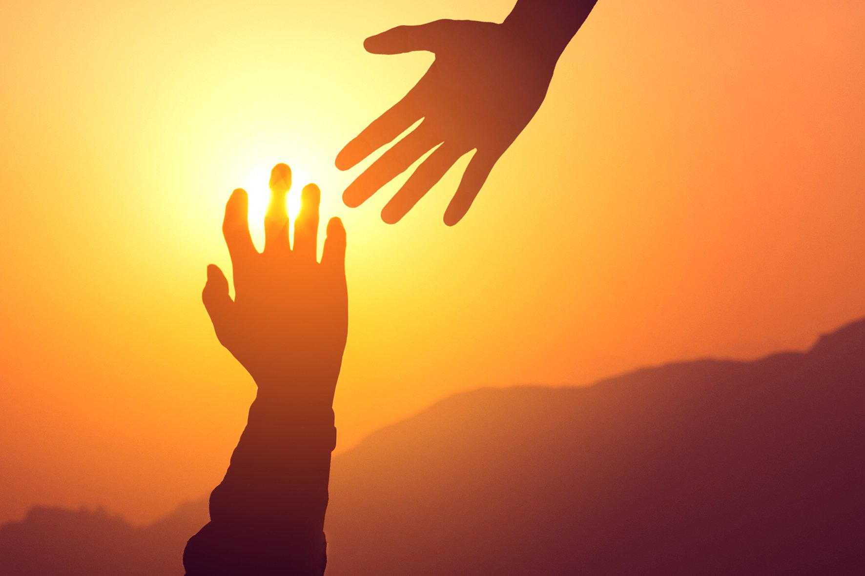 Reaching hands_shutterstock_sml